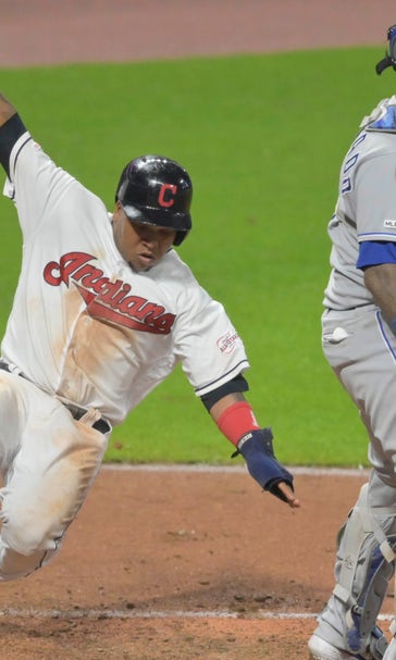 Royals wait out rain delay to fall 3-2 in extra innings